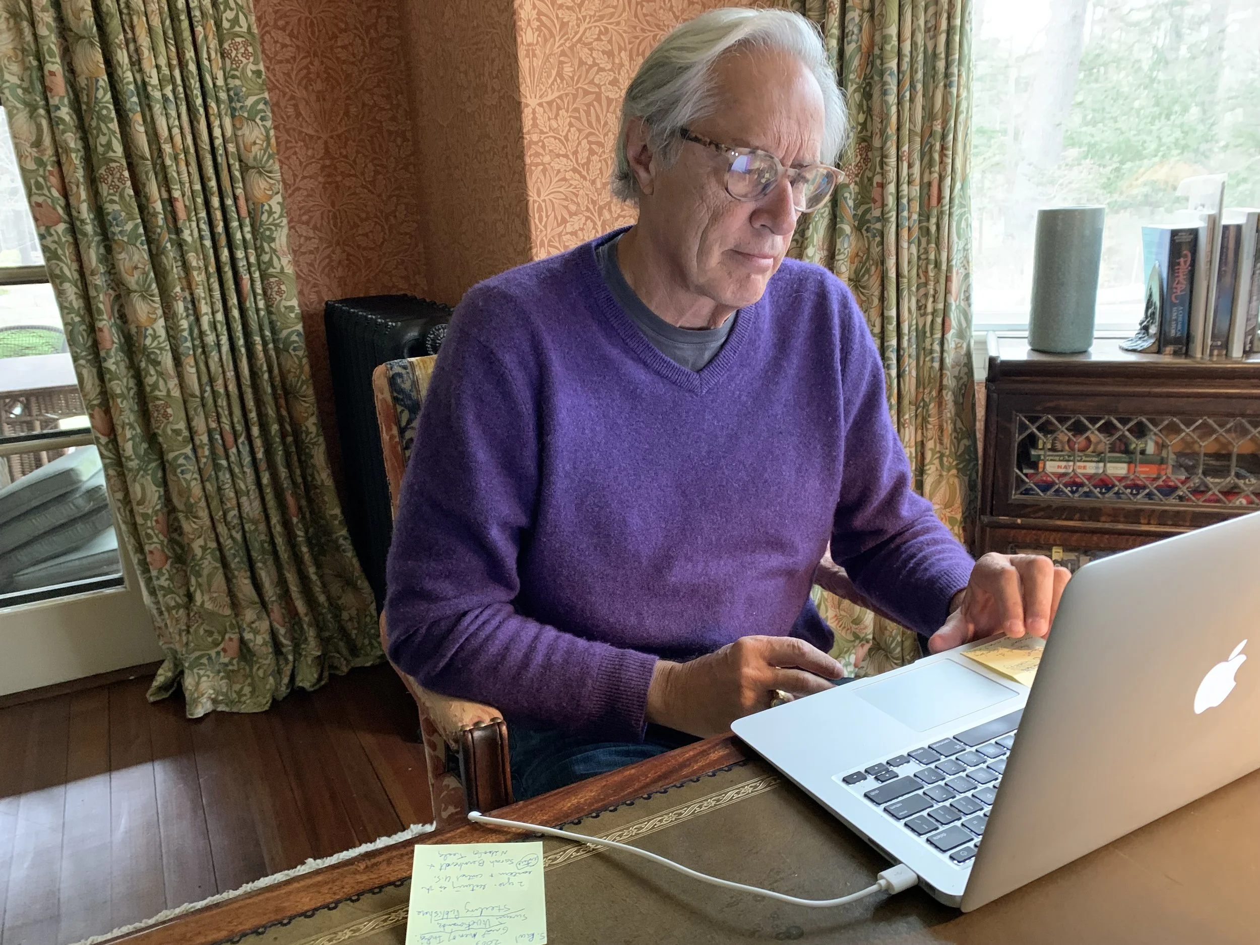 Dana Sawyer seated at desk
